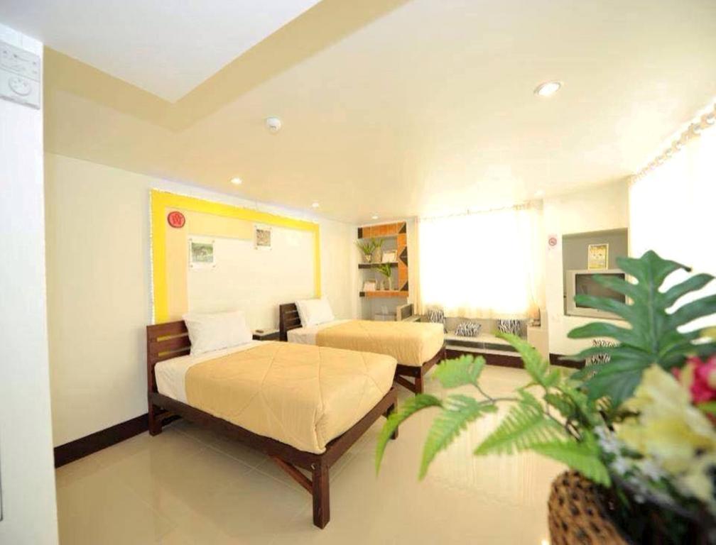 Win Hotel Phayao Habitación foto